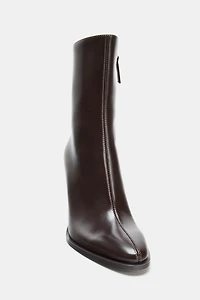 HIGH HEELED ANKLE BOOTS
