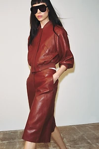 FAUX LEATHER LONG SHORTS