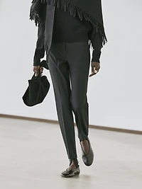 Trousers with elastic hems