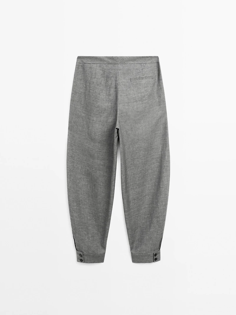 Balloon fit trousers with button details