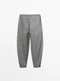 Balloon fit trousers with button details