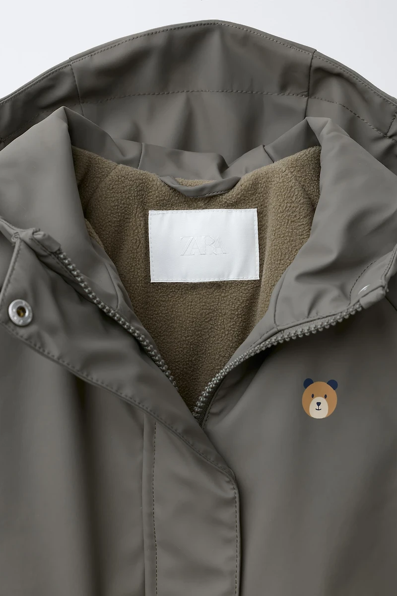 WATER-RESISTANT RUBBERIZED FLEECE-LINED RAINCOAT