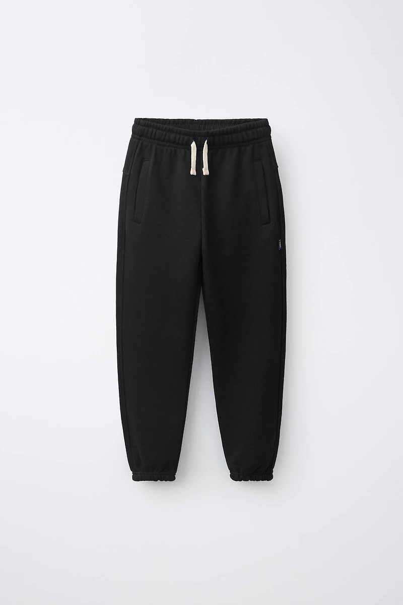 SOLID FLEECE JOGGERS WITH LABEL