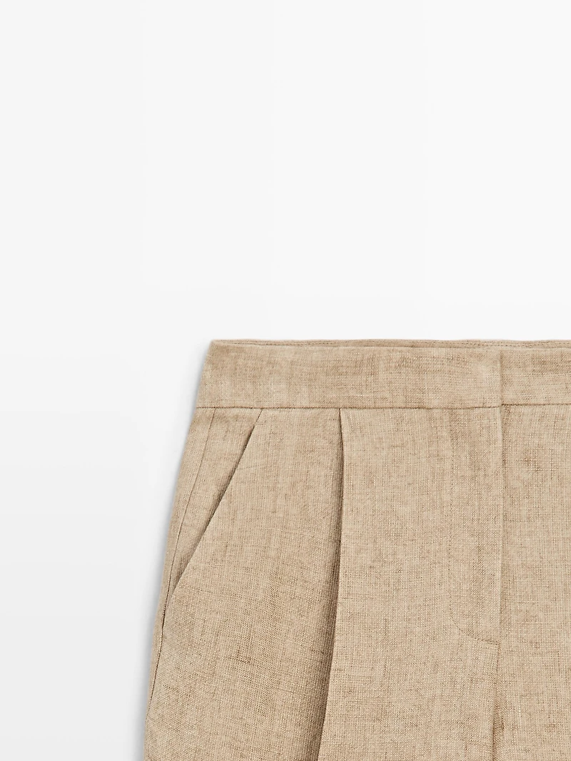 Flowing linen trousers with darts
