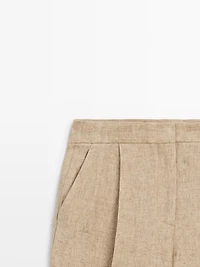 Flowing linen trousers with darts
