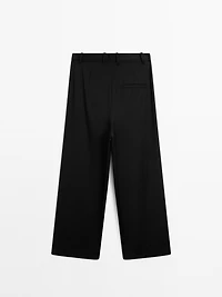 100% extra fine wool pleated trousers