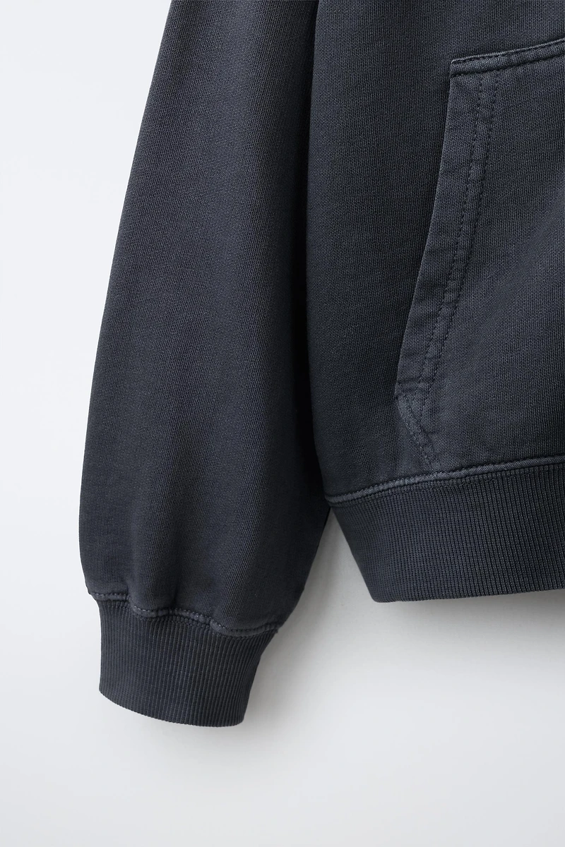 SWEAT ZIPPÉ EN MOLLETON