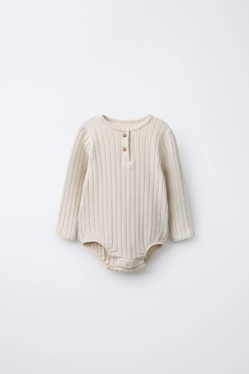 SOFT TOUCH RIBBED BODYSUIT