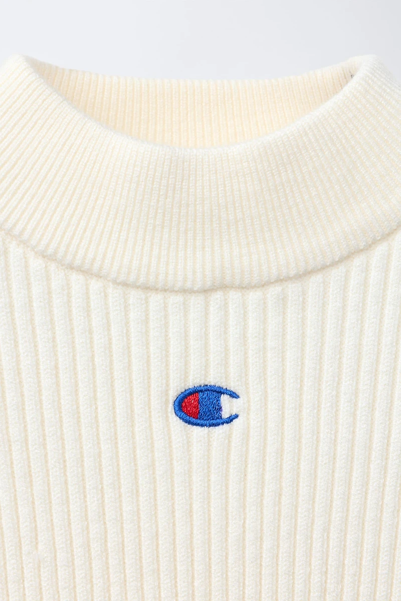 PULL CANNELÉ COL CHEMINÉE CHAMPION ® X ZARA