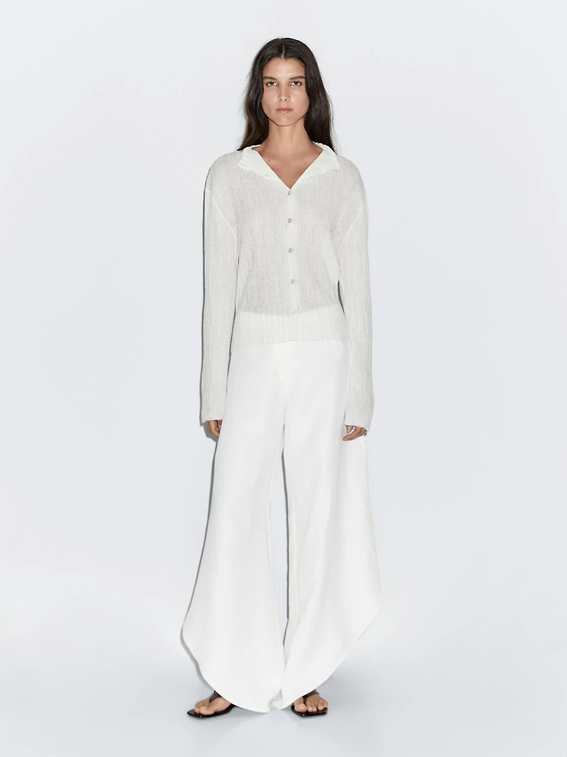 Pantalon fendu dans le bas