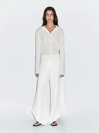 Pantalon fendu dans le bas