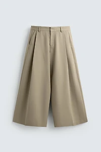 PANTALON COUPE LARGE À PLIS