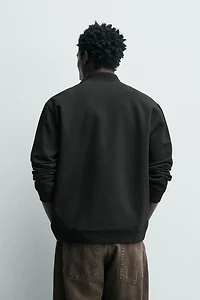 REGULAR FIT TEXTURED POLO SHIRT