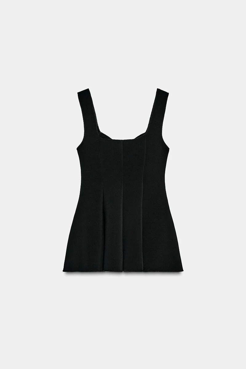 STRETCH PEPLUM TOP