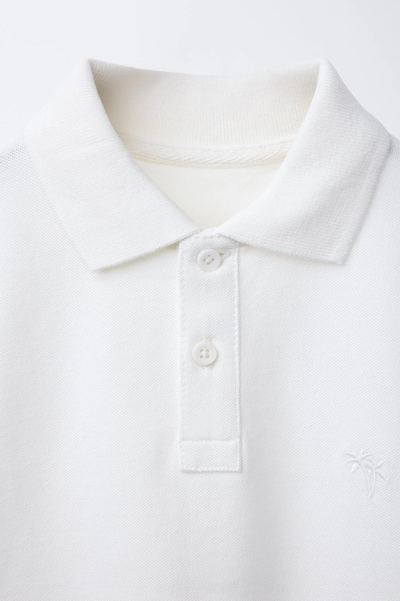 POLO BRODÉ PALMIER