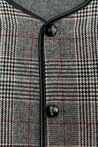 VESTE RÉVERSIBLE À LISERÉS EN MATIÈRE SYNTHÉTIQUE