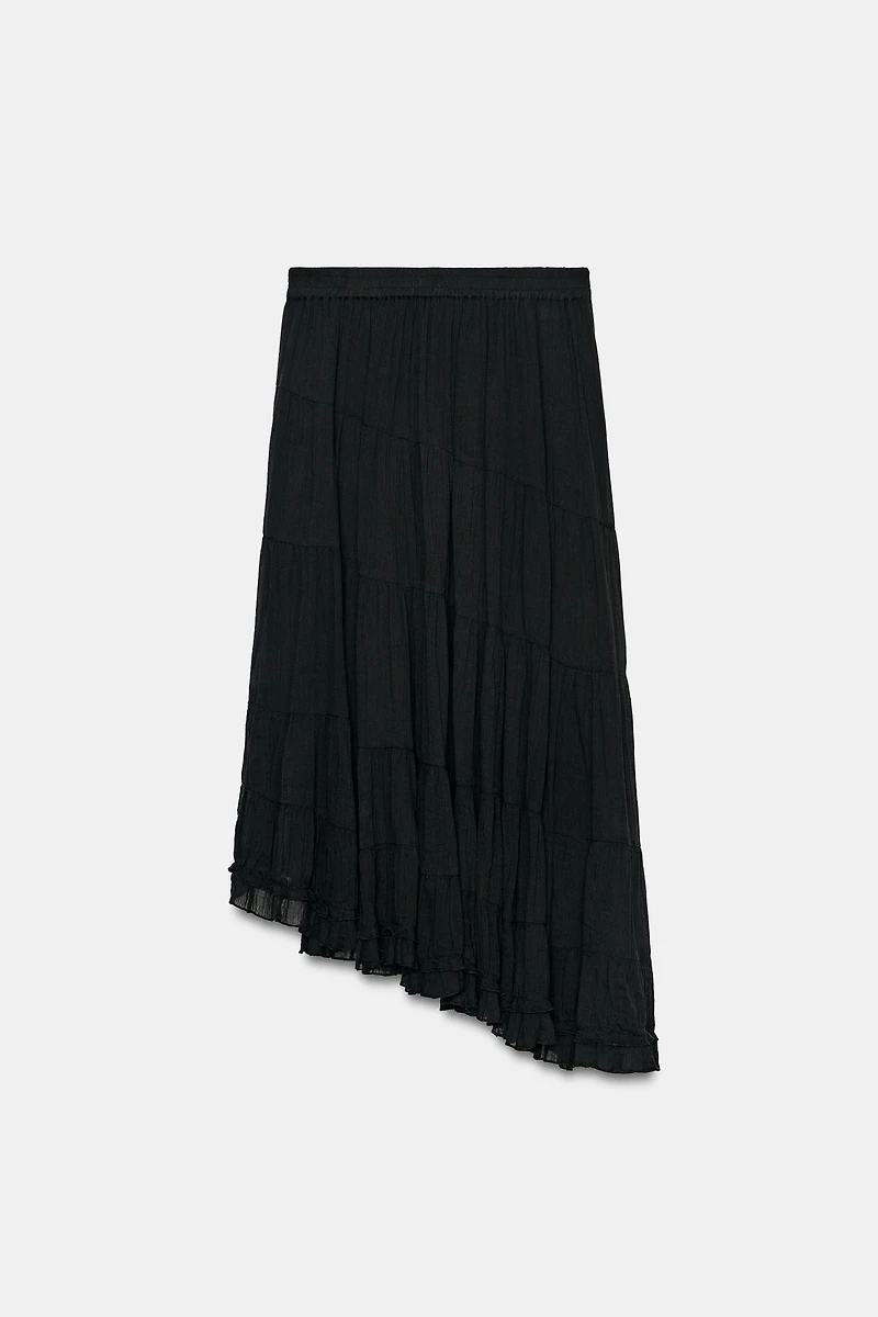 JUPE MI-LONGUE ASYMÉTRIQUE