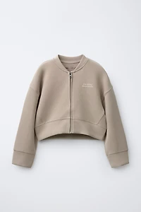 RAISED TEXT SWEATSHIRT