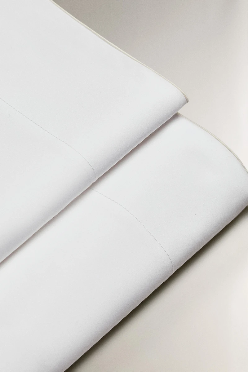 DRAP DE DESSUS OVERLOCK