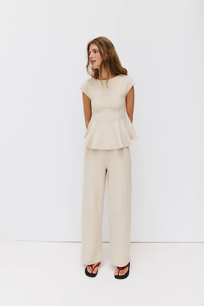 SHORT SLEEVE PIQUÉ PEPLUM TOP