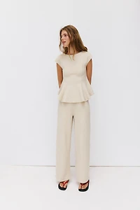 SHORT SLEEVE PIQUÉ PEPLUM TOP