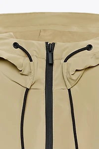 HOODED SHORT RUBBERIZED JACKET