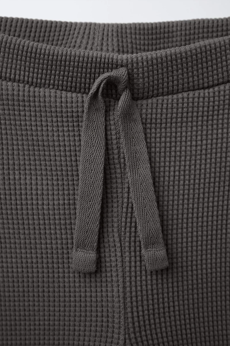 LEGGING WAFFLE À DENTELLE