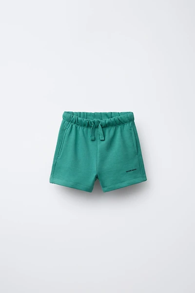TEXT PLUSH SHORTS