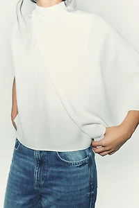 ASYMMETRIC CREPE CAPE TOP