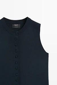 Gilet en maille fine à boutons recouverts