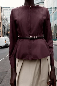 VESTE PEPLUM EFFET DAIM CEINTURÉE