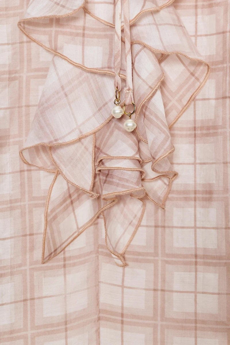 BLOUSE À CARREAUX ET VOLANTS