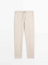 Total look linen trousers with waist detail