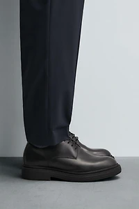 CHAUSSURES EN CUIR VOLUME