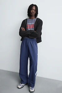 PANTALON TECHNIQUE À BANDES