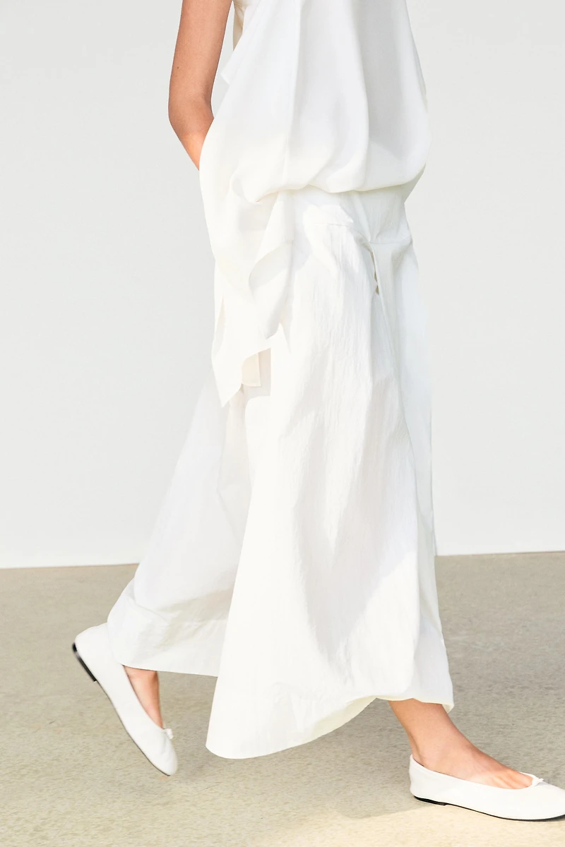Midi skirt with yoke and pleated detail