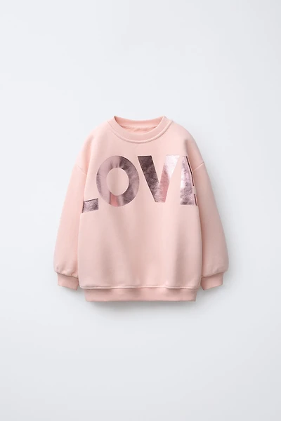 SWEAT À INSCRIPTION BRILLANTE