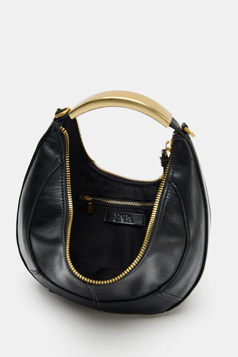 OVAL BAG WITH METAL HANDLE