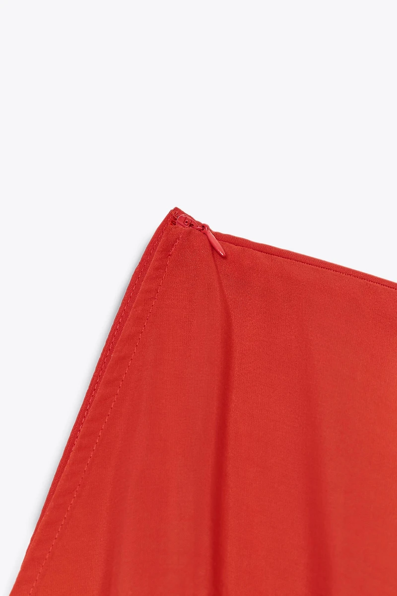 ASYMMETRIC FLOWING CAPE
