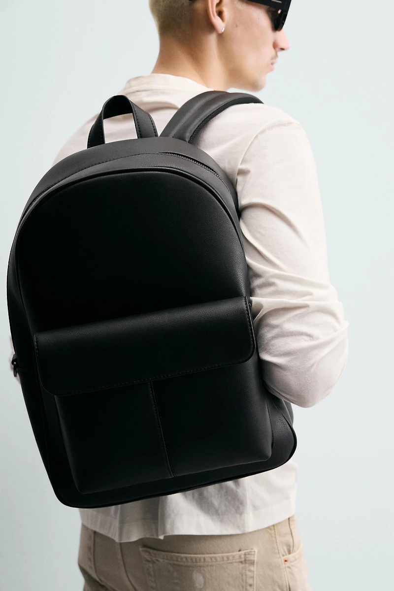 FLAP POCKET BACKPACK