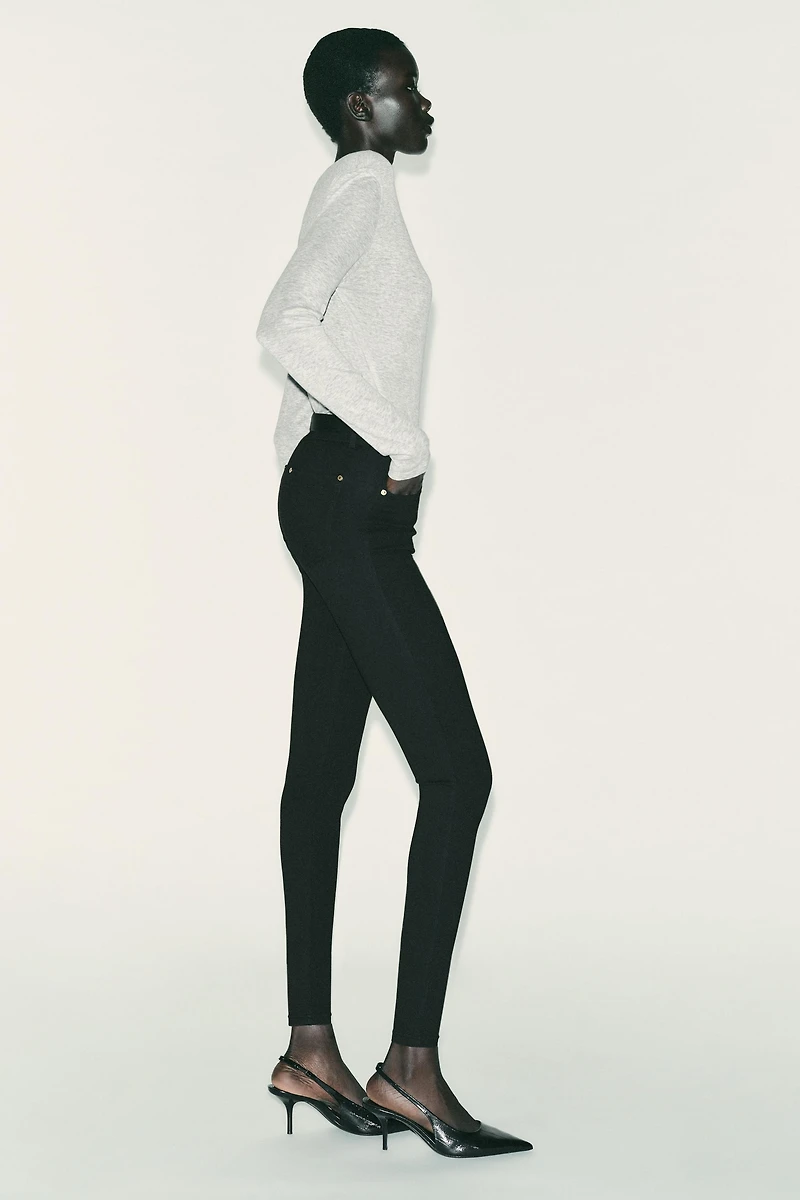 MID-RISE BELTED JEGGINGS