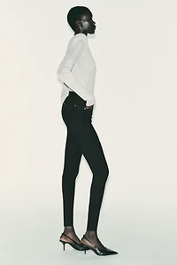 MID-RISE BELTED JEGGINGS