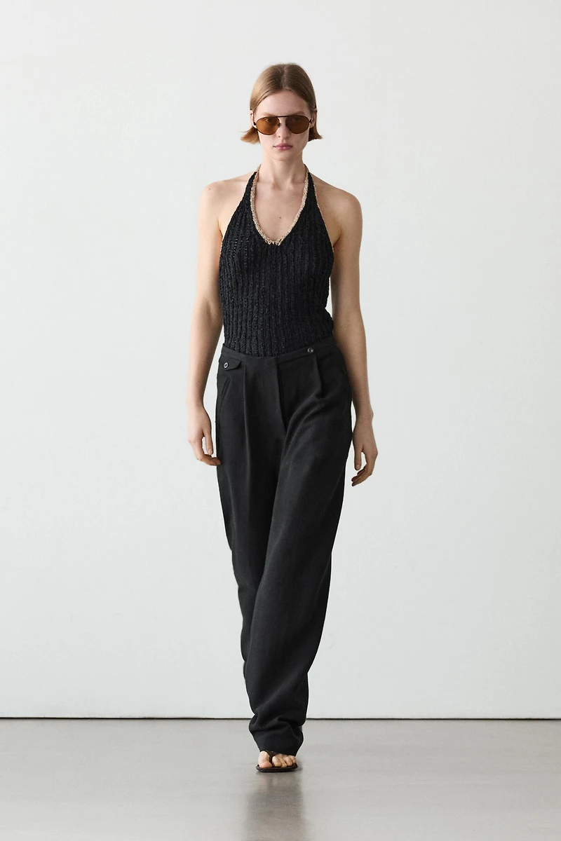 Flowing linen blend trousers with pocket details