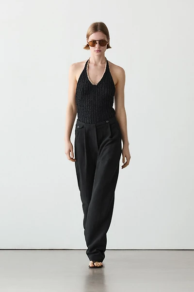 Flowing linen blend trousers with pocket details