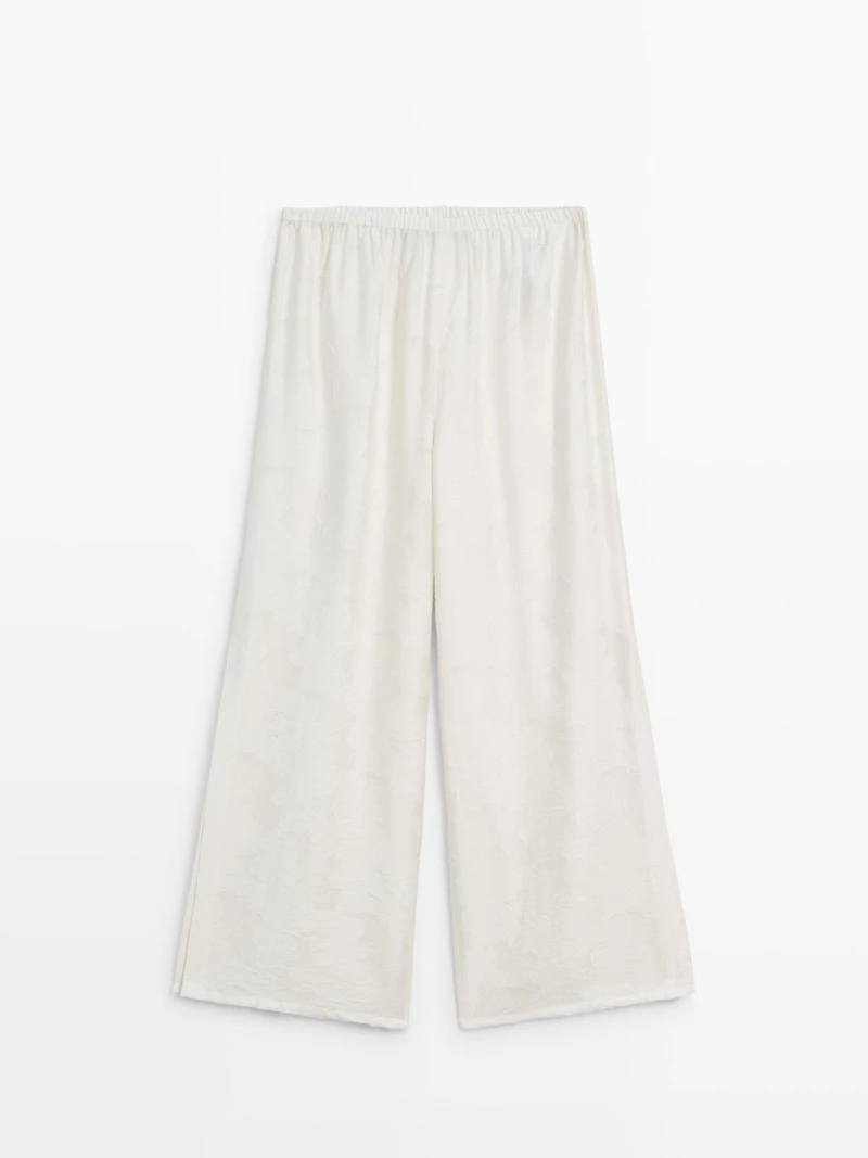 Flowing stretch trousers with fabric detail
