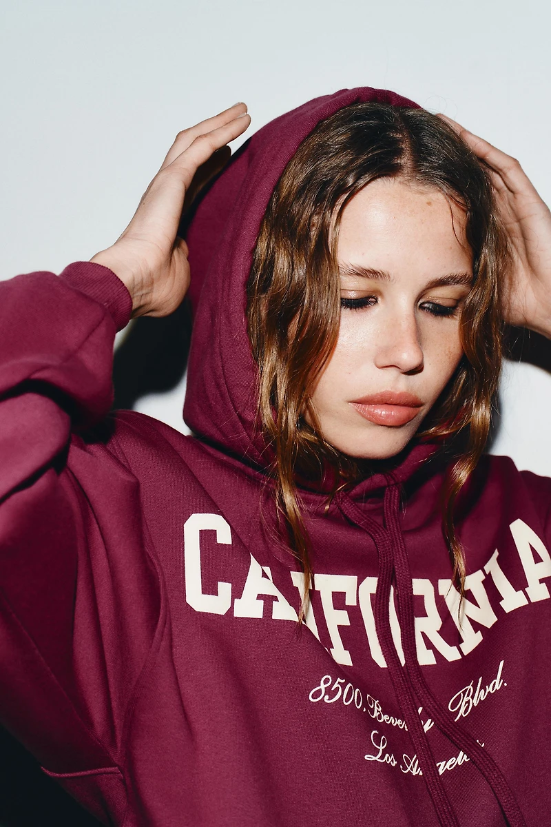 SWEAT VARSITY À VOLANT