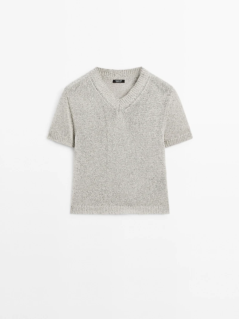 Knit sweater with fabric detail