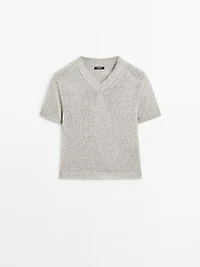 Knit sweater with fabric detail