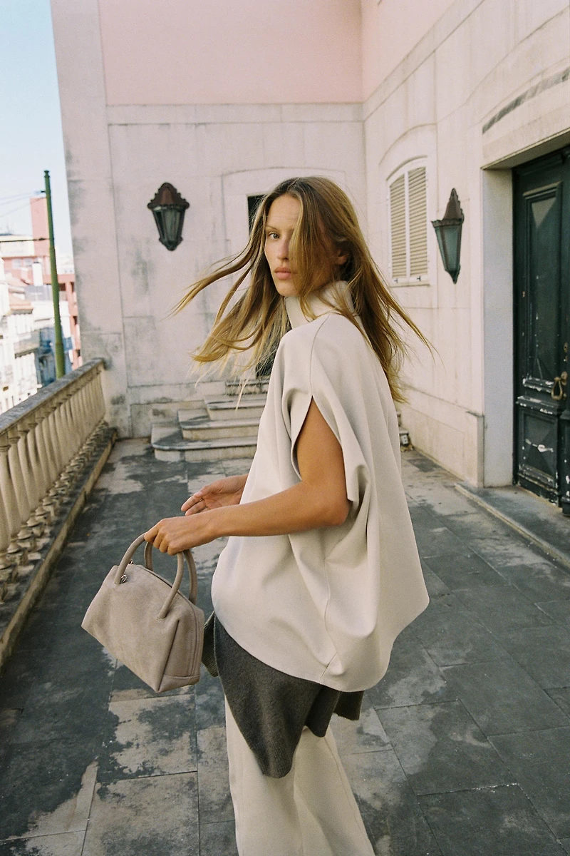 ASYMMETRIC INTERLOCK CAPE