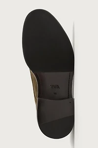 CHAUSSURES EN CUIR